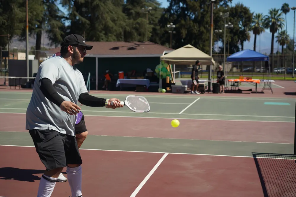 Player lines up a forehand return on court