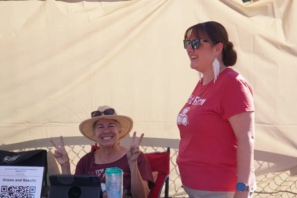 Volunteers at the tournament check-in table
